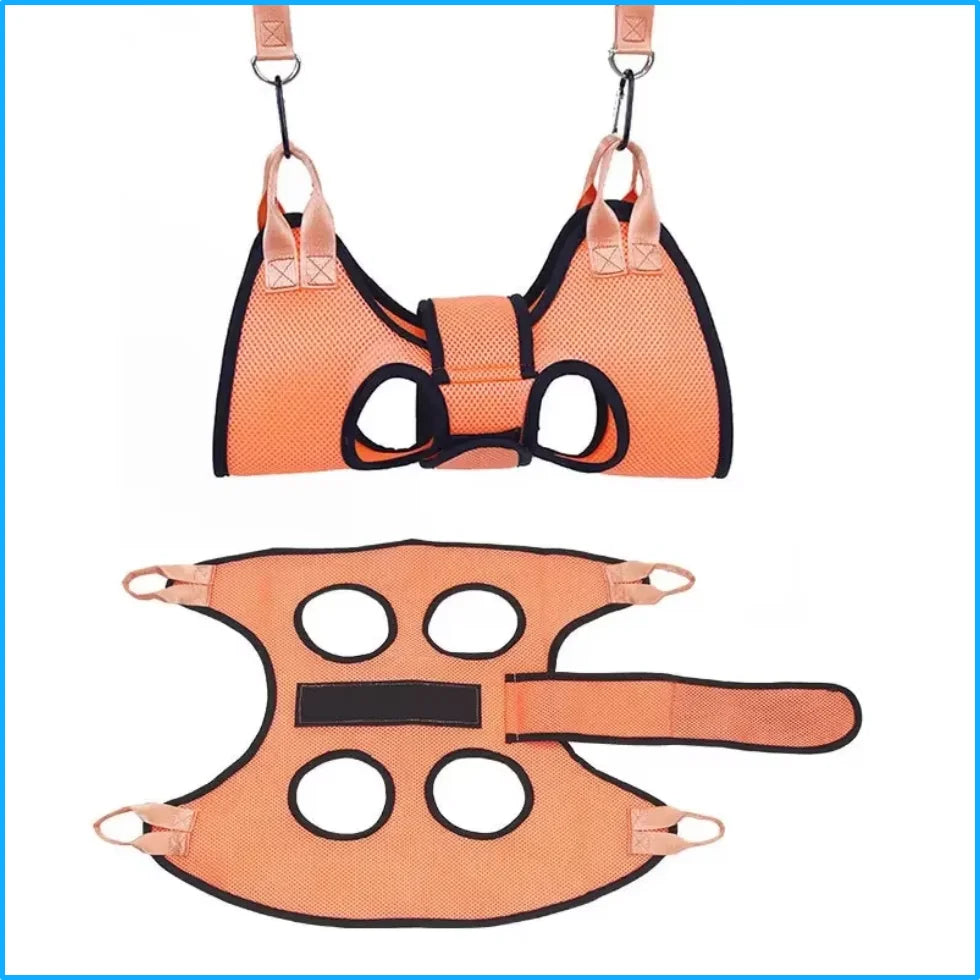 Orange pet grooming hammock pieces laid flat with straps and leg openings