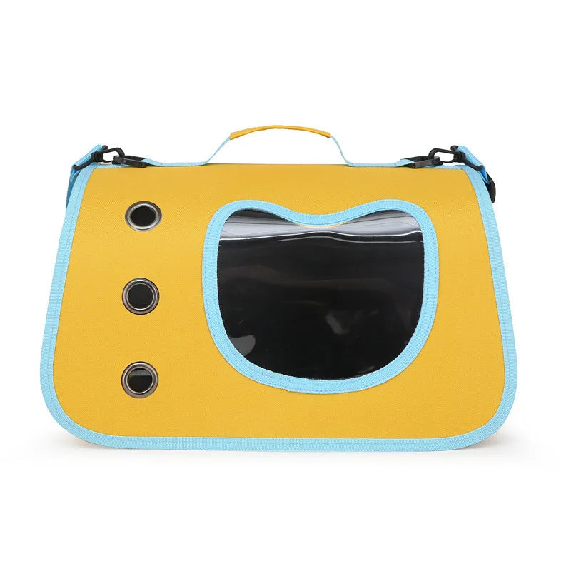Yellow pet carrier bag with blue trim and mesh window